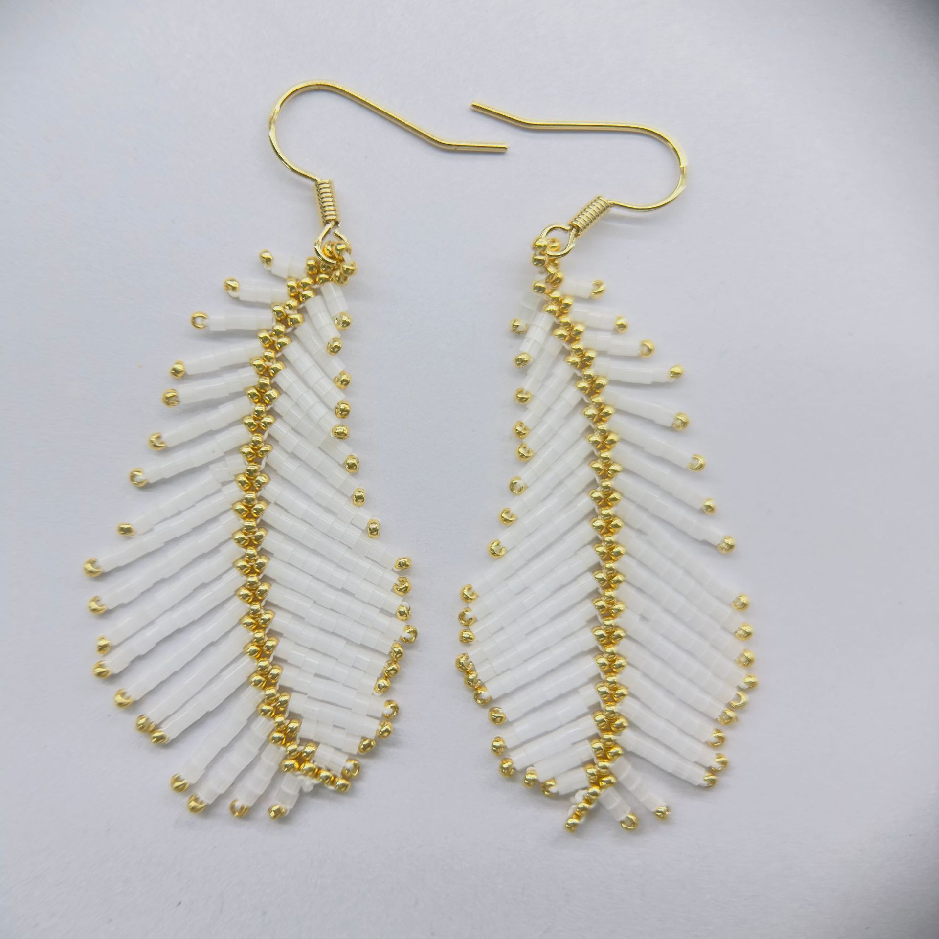 Cool Vintage Feather And Bead Earrings With Long Tassel Accents