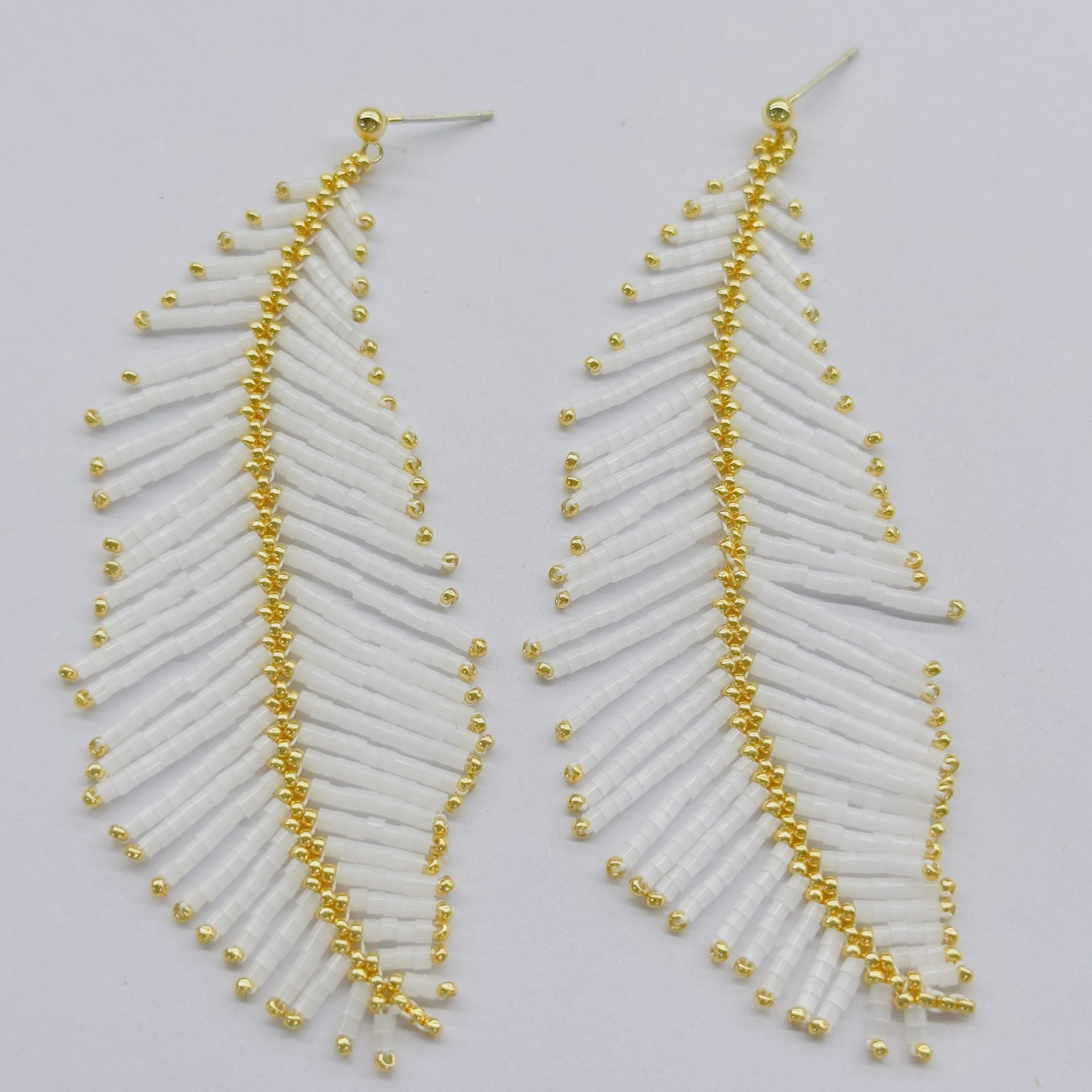 Cool Vintage Feather And Bead Earrings With Long Tassel Accents